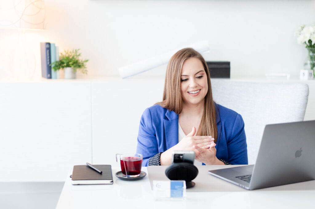 Whitney Goulish, President & Founder on a virtual call with a client