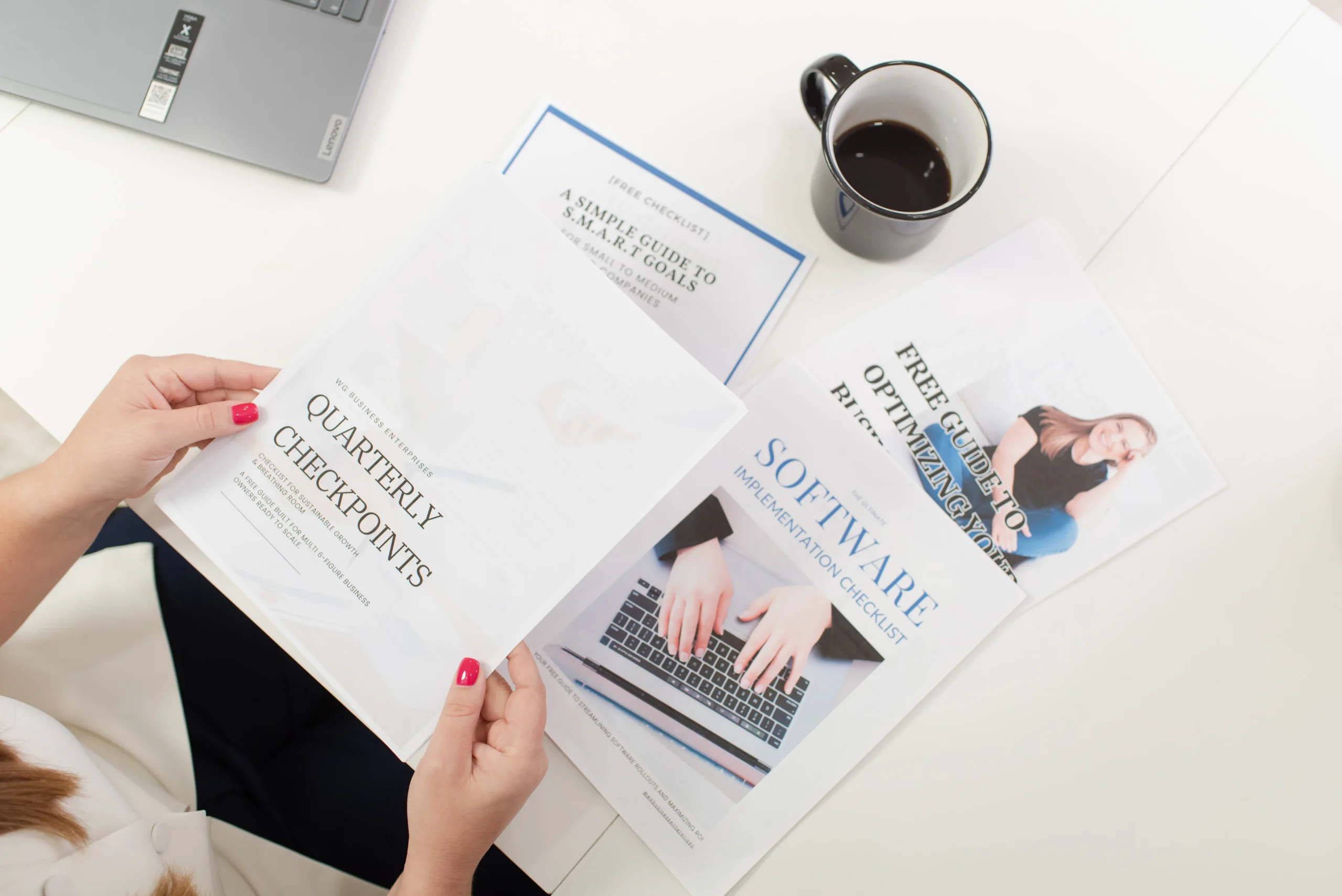 WG Business Enterprises Resource Guides Laying on Table WG Business Enterprises Resource Guides Laying on Table