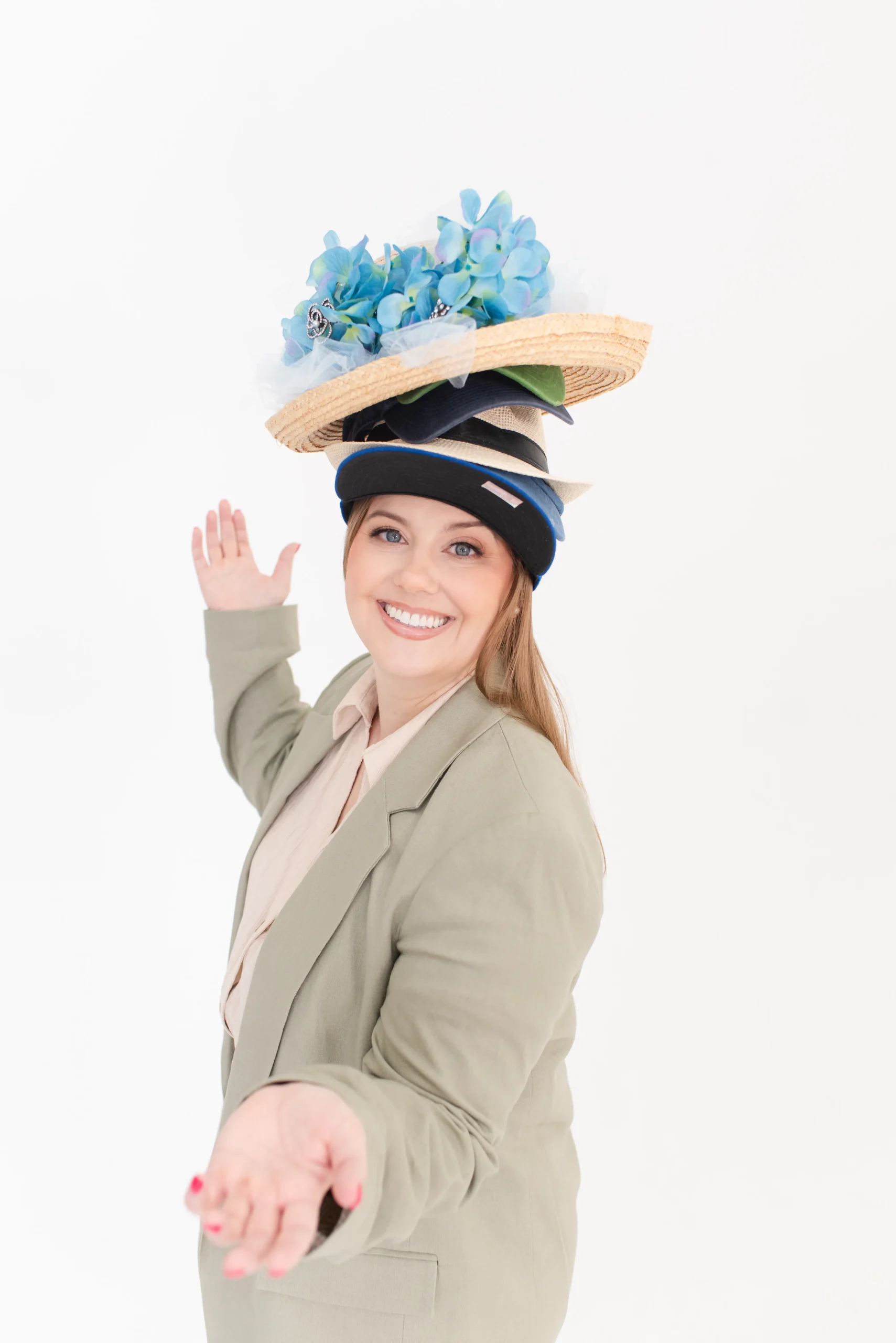 Whitney Juggling Many Hats on Head Prepared for Event Planning