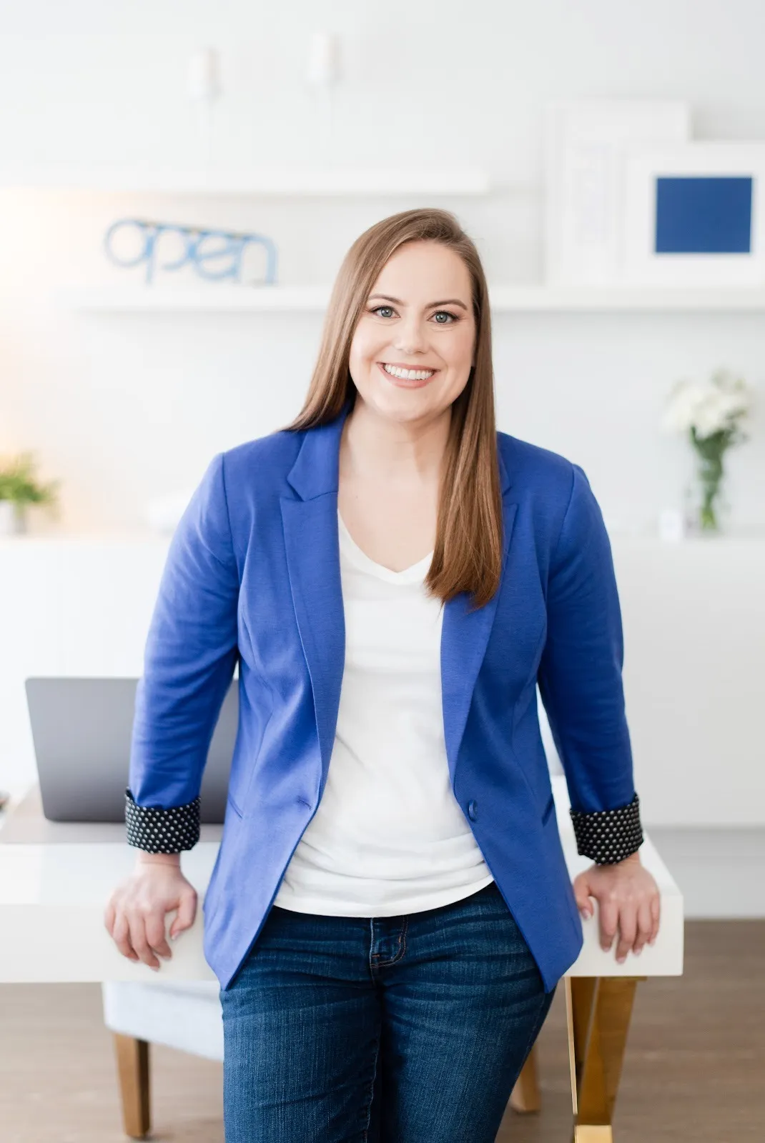 Whitney in Blue Jacket Leaning Back on Table