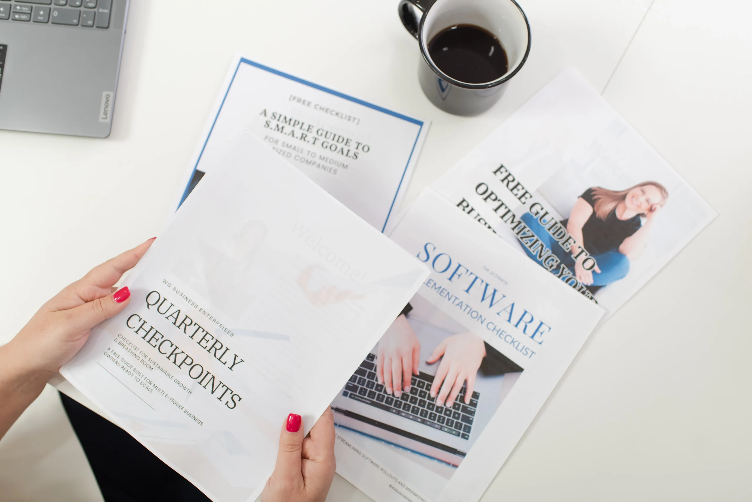Hands Holding and Reviewing Resource Guides