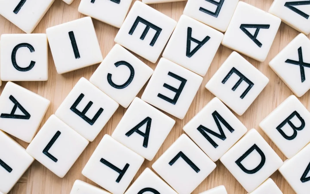 Letter Tiles Scattered on a Table to Create Business Terminology - Kathy Jones / Pexels